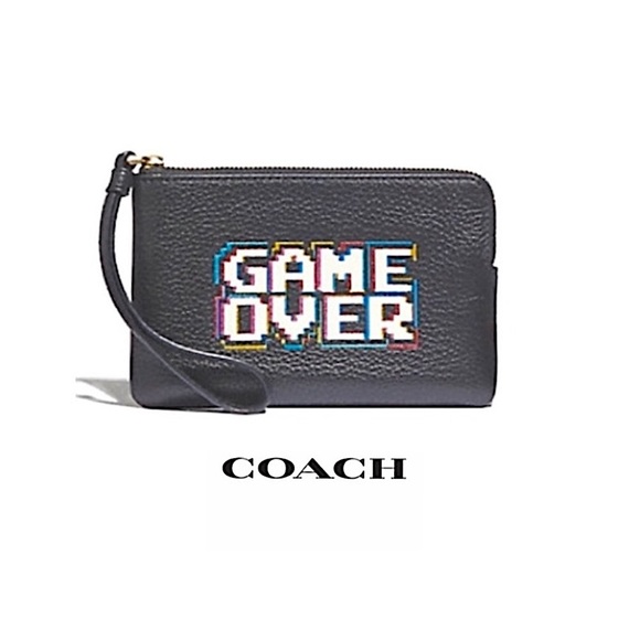 coach pac man wristlet